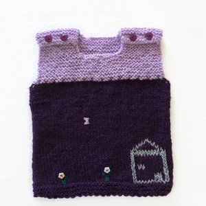 Cozy hand knitted vest for toddler